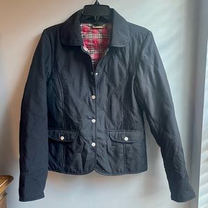 Jane Ashley Casual Lifestyle quilted vest, black with red plaid lining